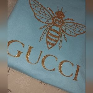 Black Tee with Gold Bee Design